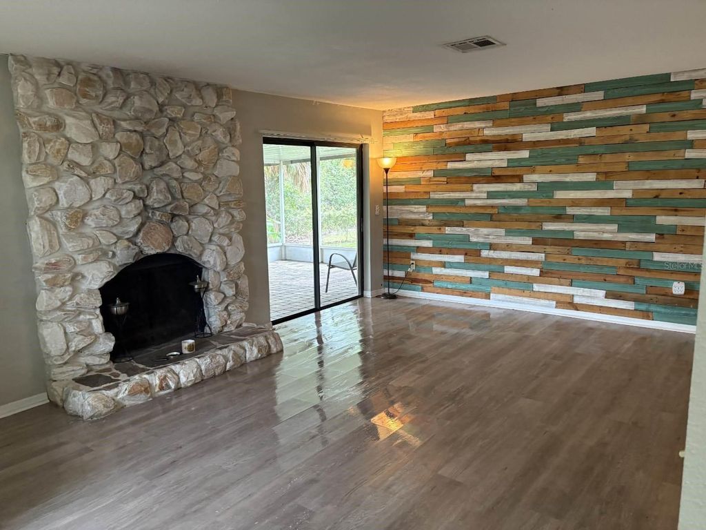 Photo of 2123 Woodburn Loop S, Lakeland, FL 33813 (MLS # TB8392347)