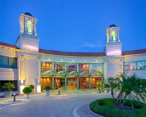 Photo of 4705 S Apopka Vineland Road #210, Orlando, FL 32819 (MLS # O6379301)