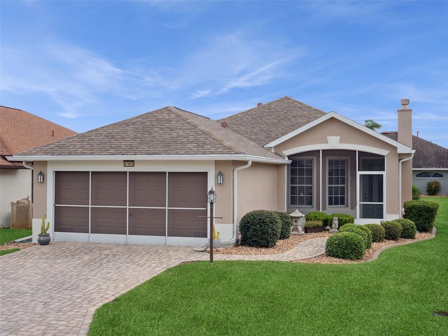 Welcome to this charming 3-bedroom, 2 bathroom Balmoral Model home, perfectly situated in a quiet, gated 55+ golf community in Central Florida’s Lake County! The exterior has fresh paint, a paver drive & walkway, screened entry with ceramic tile and gorgeous landscaping.  The open concept living and dining spaces create a bright and inviting atmosphere for relaxing and entertaining.  All main living areas have high quality engineered wood flooring and the natural light in this home is exceptional. The spacious primary suite features a private bathroom and walk-in closet for added comfort and convenience.  Multiple linen closets, dual vanity, make up area, and an enlarged rain shower primary bath are just the beginning.  Two additional bedrooms offer flexibility for guests, a home office, or give yourself a music, craft, and zen space!  You’ll love the modern kitchen equipped with updated cabinets & appliances, granite countertops, built-in pantry, and a breakfast nook.  Enjoy outdoor living with an enclosed screened front porch, mature landscaping, and a lovely rear Florida Room with ceramic tile flooring—perfect for morning coffee and afternoon tea!  The attached garage provides secure parking and extra storage.  2012 Central heating and cooling ensure year-round comfort, but you’ll really love the gas fireplace in the living room, perfect for autumn nights and cool, quiet mornings.  Boasting high ceilings, updated interior paint, tinted UV windows & sliders, new garage door opener, bull-nose corners, transferable termite bond, and an attic fan. You’ll immediately know this original owner took immaculate care and pride in this 1613 square foot home (including Florida Room).  This is an easy choice.  Call for your community & home tour today.  Move-in ready and close to shopping, dining, amusement parks, historic districts, and the Florida Turnpike for ultimate convenience.  Royal Highlands has two pools, an on-campus restaurant, driving range, courts, fitness center, billiards & craft rooms, softball field, dance hall, theater stage and 100’s of clubs and activities to choose from!  What are you waiting for?