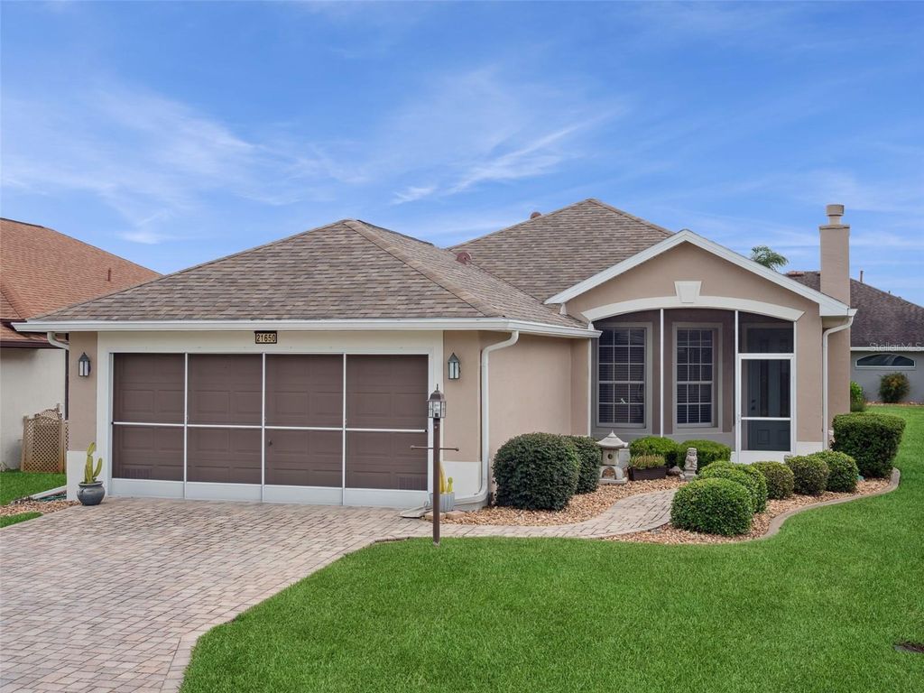 Photo of 21650 Stirling Pass, Leesburg, FL 34748 (MLS # G5102999)