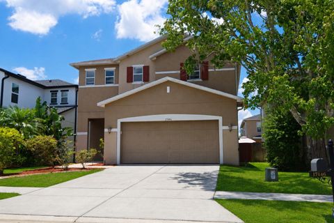Photo of 17446 Queensland Street, Land O Lakes, FL 34638 (MLS # TB8512614)