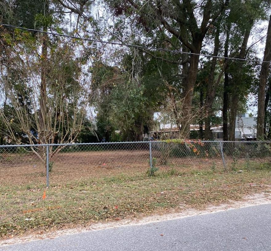 Lightly wooded lot in an area of established homes, businesses, local eateries and Highways 441, 301. Great investment opportunity.