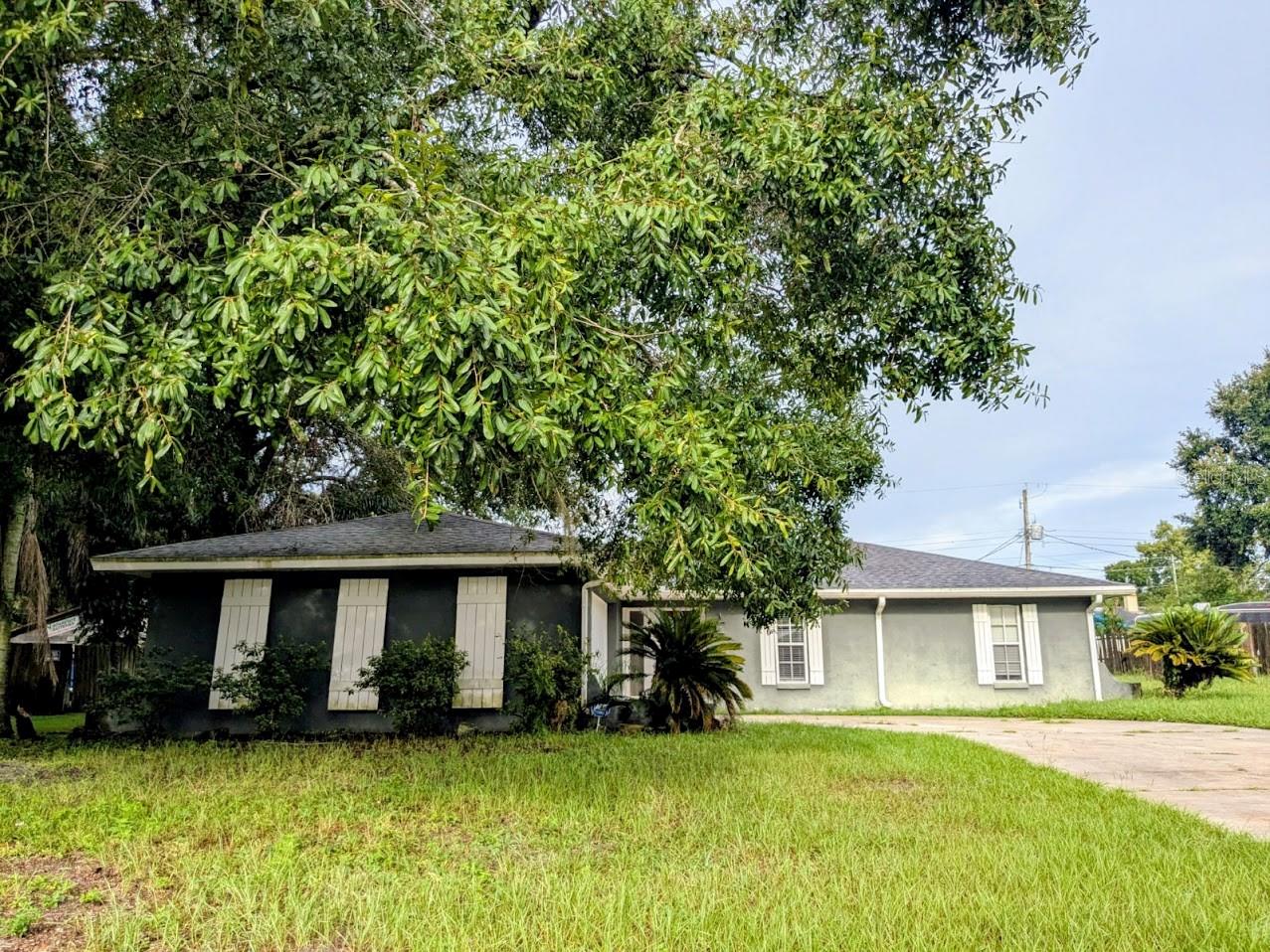 Freshly painted three-bedroom, two bathroom home, with spacious living room complete with a wood-burning fireplace, dining room, kitchen with closet pantry, master suite with generously sized walk in closet, large backyard with patio, and a two car garage with laundry hookups and a garage door opener. Tile and laminate flooring throughout home; no carpet! No HOA! Home available immediately. One small pet accepted with a $400 pet deposit.