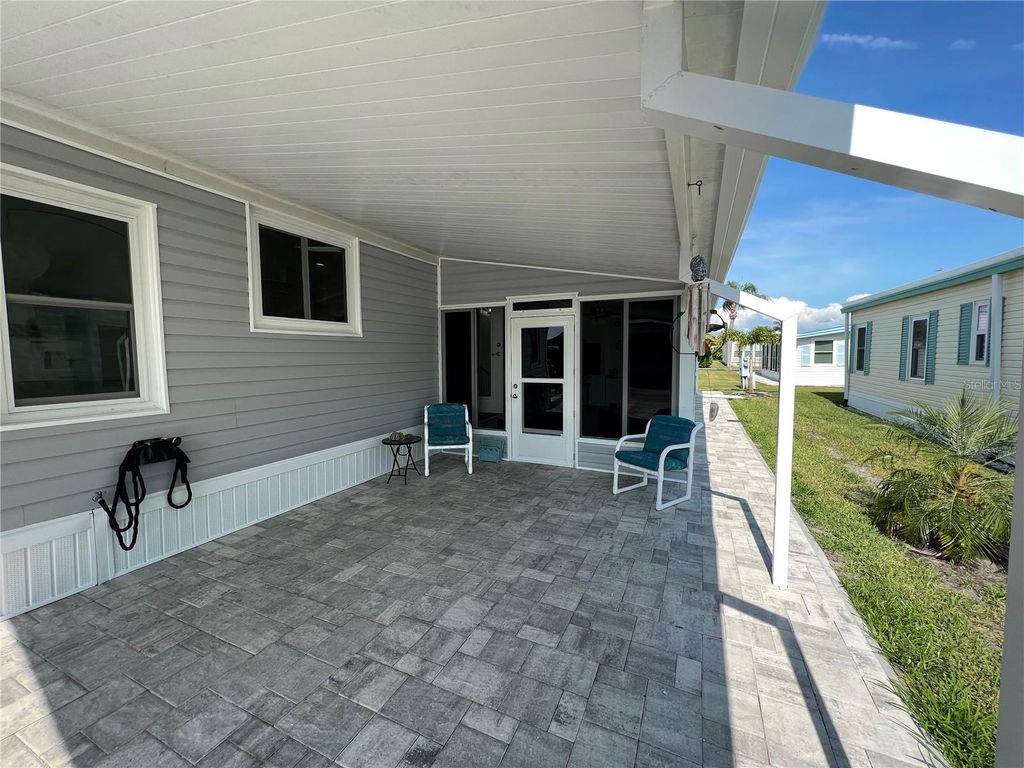 Photo of 2038 Maui Drive, Holiday, FL 34691 (MLS # TB8500721)