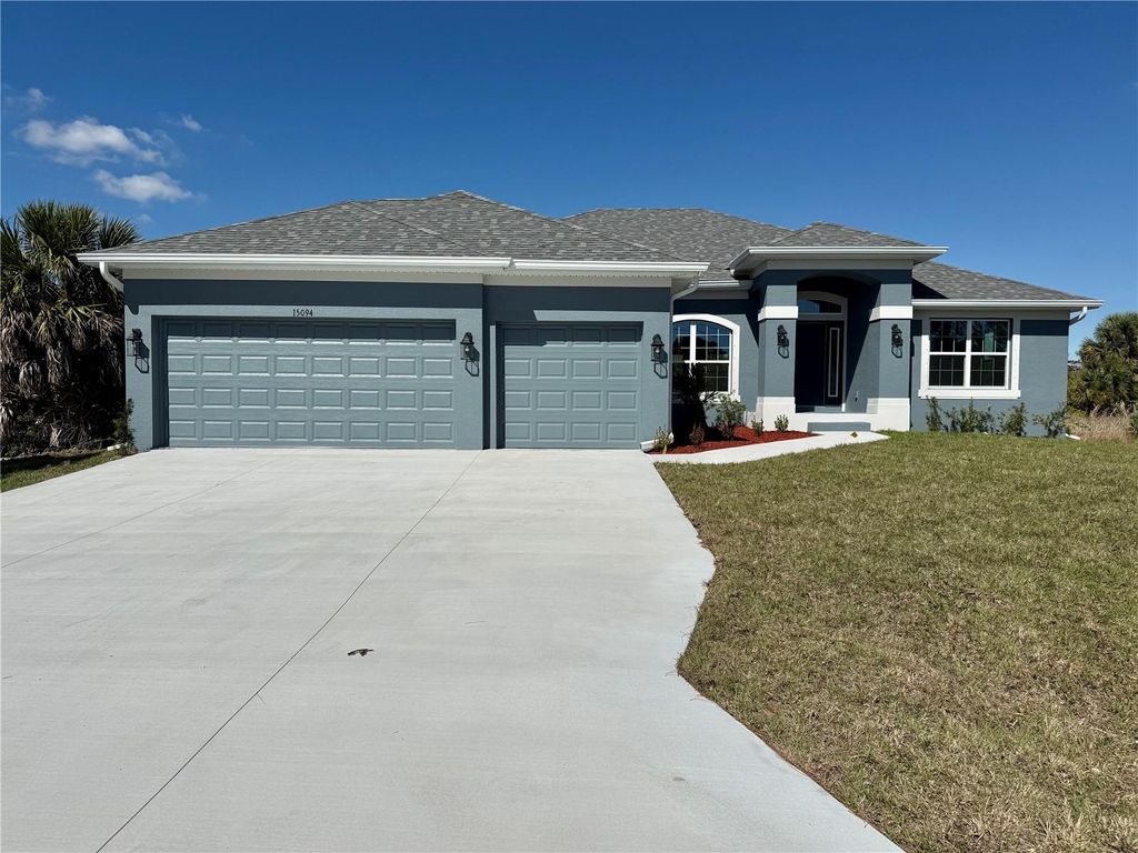 Photo of 15094 Amsterdam Avenue, Port Charlotte, FL 33981 (MLS # C7522074)