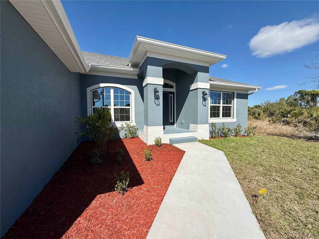 Photo of 15094 Amsterdam Avenue, Port Charlotte, FL 33981 (MLS # C7522074)