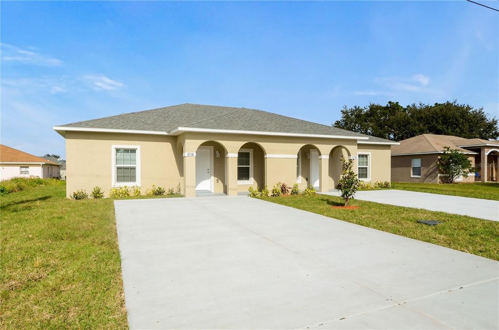 Photo of 411 Blackbird Way, Kissimmee, FL 34759 (MLS # O6370511)