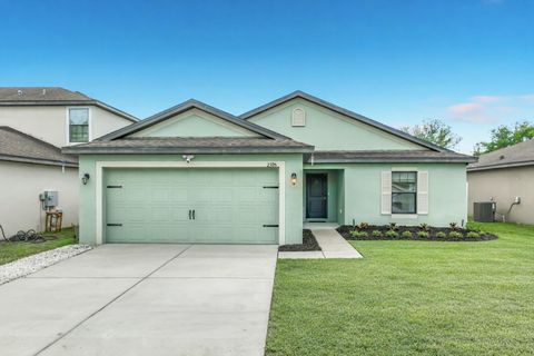 Photo of 2395 Bracknell Forest Trl, Tavares, FL 32778 (MLS # O6398903)