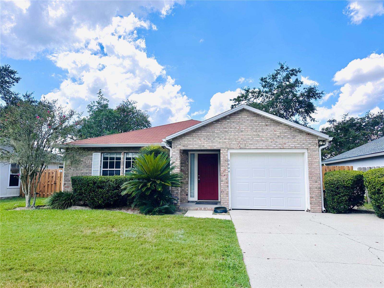 Welcome to your new home in the sought-after Palm Grove community! This charming brick-front beauty offers 3 bedrooms, 2 bathrooms, and 1,365 square feet of freshly updated living space. Step inside and you'll love the brand-new vinyl plank flooring that flows throughout, paired with a fresh coat of paint that makes the whole home feel bright and inviting. The open layout gives you plenty of space to relax, entertain, and make memories. A spacious attached garage gives you plenty of storage. In the backyard, a new privacy fence creates the perfect backdrop for barbecues, playtime, or just unwinding with your favorite drink. With its modern updates and cozy feel, this home is truly move-in ready—you just need to bring your furniture and your personal touch. Palm Grove living means you're close to shopping, dining, local hot spots and colleges.