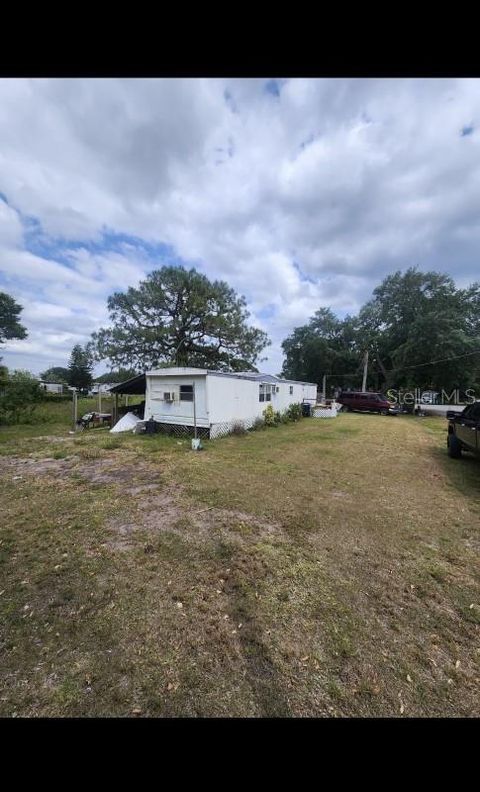 Photo of 9237 SE 58th Drive, Okeechobee, FL 34974 (MLS # A4676010)