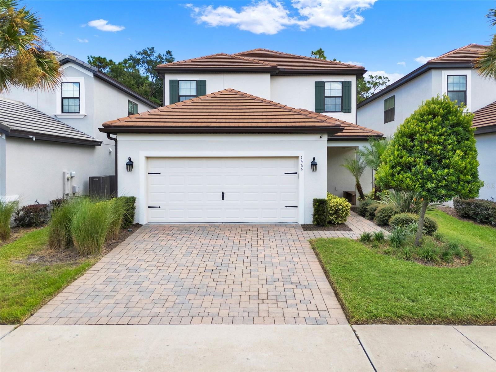 Stunning 4-Bedroom Taylor Morrison Home in a Premier Winter Park Community! Welcome to this beautifully appointed 4-bedroom, 3.5-bath, 2,582 sq. ft., nestled in one of Winter Park’s most desirable gated communities with resort-style amenities. Built just 4 years ago, this residence blends modern elegance with comfort and convenience.
Step inside to find an open-concept design with luxury vinyl plank flooring throughout the main living areas and a gourmet kitchen featuring GE Café Series appliances, SS vent hood and an oversized quartz countertop with plenty of space for entertaining. A dedicated home office makes working from home effortless, while the upstairs loft and expansive media room offer flexible space for relaxation or play.
The owner’s suite includes a spa-like bath and a custom built-in shelving system in the walk-in closet. Additional highlights include tile flooring in select areas, a screened-in lanai, and no rear neighbors for enhanced privacy.
This smart home is equipped with modern upgrades, including a gutter system, paver driveway, tile roof for longevity, and a 2-car garage. With landscaping handled by the community, you’ll enjoy low maintenance living and more time to take advantage of the incredible amenities.
Located in the heart of Winter Park, this property offers the perfect blend of luxury, convenience, and lifestyle.
