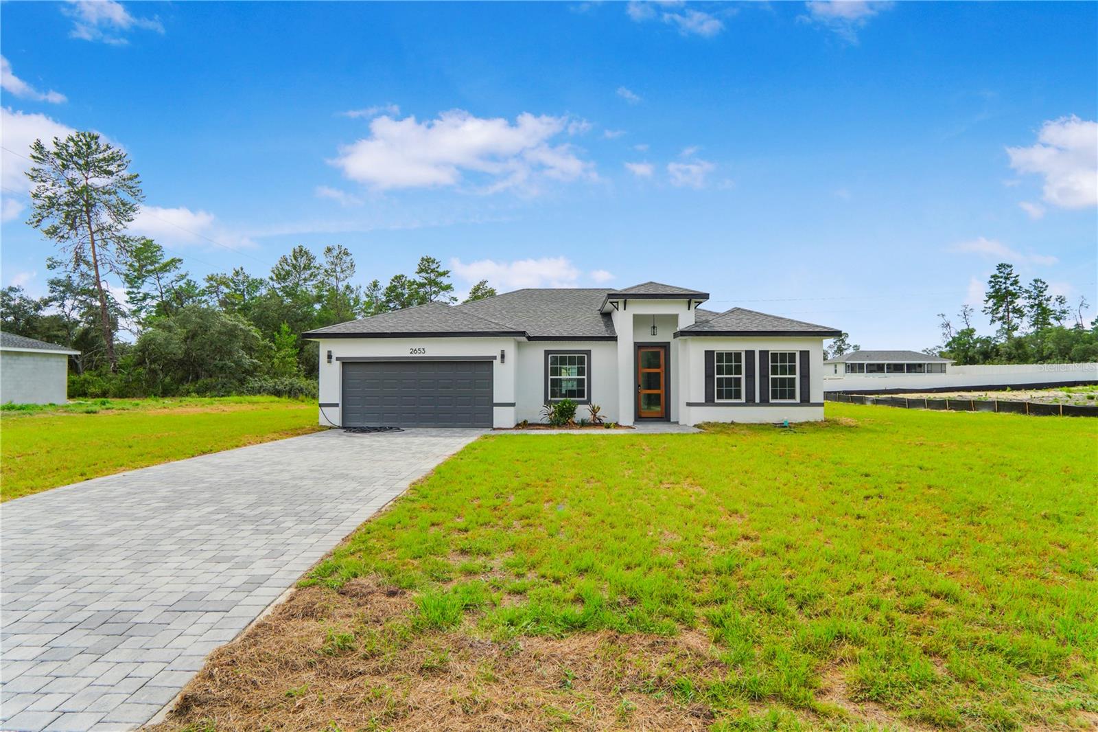 New 4-Bedroom Home on Oversized 0.50 Acre Lot – A Rare Rental Opportunity!
Step into this stunning brand new 4-bedroom home, perfectly designed for comfort, style, and functionality. Situated on a rare oversized 0.50 acre lot, this home offers exceptional space both inside and out – ideal for families or anyone looking for room to spread out.
The home features four spacious bedrooms, including a beautiful primary suite with a walk-in closet. The remaining bedrooms each include built-in closets, offering plenty of storage and convenience.
Enjoy two full bathrooms that are modern, spacious, and thoughtfully designed. The large kitchen is a true highlight – featuring elegant stone countertops, solid wood cabinets, and high-quality appliances already included. Whether you’re cooking a weeknight meal or hosting friends, this kitchen is ready for it all.
The open living room flows seamlessly into the dining area, creating a warm and inviting space. Sliding glass doors lead to the backyard, opening up to a generously sized lot that’s much larger than average – perfect for outdoor living, entertaining, or relaxing in your own private space.
Additional features include a 2-car attached garage for easy parking and extra storage.
Located in a great neighborhood and just minutes from a nearby grocery store, this home offers both convenience and quality. Don’t miss your chance to rent this exceptional new property!