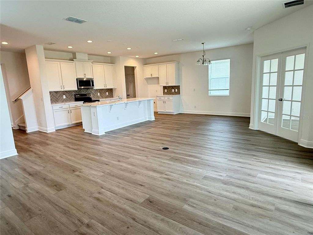Photo of 7497 Catania Loop, Clermont, FL 34714 (MLS # O6408521)