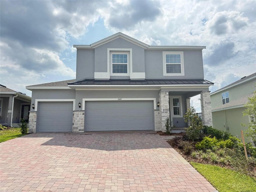 Don't miss your opportunity to own one of the final Move-In Ready Vero plans in the sought-after Ridgeview Community, offering a 3-car garage and no rear neighbors for added privacy! This stunning 4-bedroom, 2.5-bath home features a versatile Study/Den with elegant French doors, ideal for a home office or flex space, along with beautiful Luxury Vinyl Plank flooring in the first floor main living areas and upscale finishes including soaring 9'4" first-floor ceilings, 5 1/4" baseboards, and window blinds throughout. The beautifully designed kitchen showcases upgraded 42" cabinetry with crown molding, sleek quartz countertops, stainless steel appliances, and a stylish tile backsplash, all opening to a spacious Great Room and covered rear Lanai perfect for entertaining and everyday indoor-outdoor living. The luxurious Primary Suite offers a private sitting room and spa-inspired bath with dual sinks in adult height vanity, quartz counters, and walk-in shower with upgraded wall tile surround and frameless glass enclosure, creating the perfect retreat to call home. Located in the desirable Ridgeview community, residents enjoy outstanding amenities including a pool and playground. Just steps from Lake Louisa State Park and adjacent to the exciting new Olympus Project, Ridgeview also offers direct access to Schofield Road—connecting Clermont to Winter Garden. Enjoy the convenience of nearby shopping, dining, and easy access to major thoroughfares for a connected and active lifestyle.