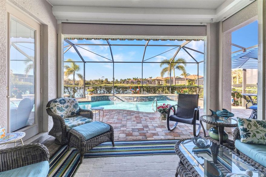 Discover the finest in Florida living in this beautifully decorated 3-bedroom, 2-bath + office home situated in the sought-after gated golf course community of Riverwood. Overlooking a tranquil pond, this home greets you with a brick paver driveway and fresh coastal colors that establish a light and airy atmosphere throughout. Step inside to find ceramic tile flooring in the main living areas, while the bedrooms and office boast rich solid wood floors. Plantation shutters, crown molding, and a lovely tray ceiling in the living room enhance the open, split-bedroom floor plan. Sliding glass doors open to a spacious 26' x 40' brick lanai, where tranquil water views and a sparkling heated saltwater pool await. The soothing sound of the pool’s water feature adds to the relaxing atmosphere. Recent upgrades include a new pool heater and salt cell, ensuring worry-free enjoyment. Whether you're soaking up the sun or seeking shade, the electric awning has you covered, and the electric roll-down shutter on the lanai provides storm protection and peace of mind. Designed for easy entertaining, the kitchen opens directly to the living area and includes granite counters with a tile backsplash, solid wood soft-close cabinetry, stainless steel appliances, a breakfast bar, and a sunny dining nook. A spacious primary suite with a coffered ceiling and private access to the lanai is en suite, featuring dual sinks, a large tiled walk-in shower, and a generous walk-in closet. Two guest bedrooms and a full guest bath provide plenty of space for family and friends—one guest room even features a charming bay window! You’ll also appreciate the private office/den and the laundry room, with extra storage and a utility sink conveniently located off the kitchen. For added peace of mind, there’s an electric roll-down shutter at the front door, along with shutters for the rest of the home. A spacious 2-car garage completes the package, offering plenty of room for your vehicles and storage needs. Furnishings are negotiable outside of the contract, making this a truly move-in-ready opportunity. As a resident of the vibrant Riverwood community, you’ll enjoy resort-style amenities, including a par 72 championship golf course, a state-of-the-art fitness center, a resort-style pool, pickleball courts, and Har-Tru tennis courts. Just beyond your doorstep, take advantage of world-class fishing, boating, dining, shopping, and the pristine beaches of the Gulf of Mexico. Ideally situated between Sarasota and Ft. Myers on Florida’s scenic West Coast, Riverwood offers the perfect blend of relaxation and adventure. Don’t miss the opportunity to make this beautiful home your own! BEACH CLUB MEMBERSHIP AVAILIABLE!!