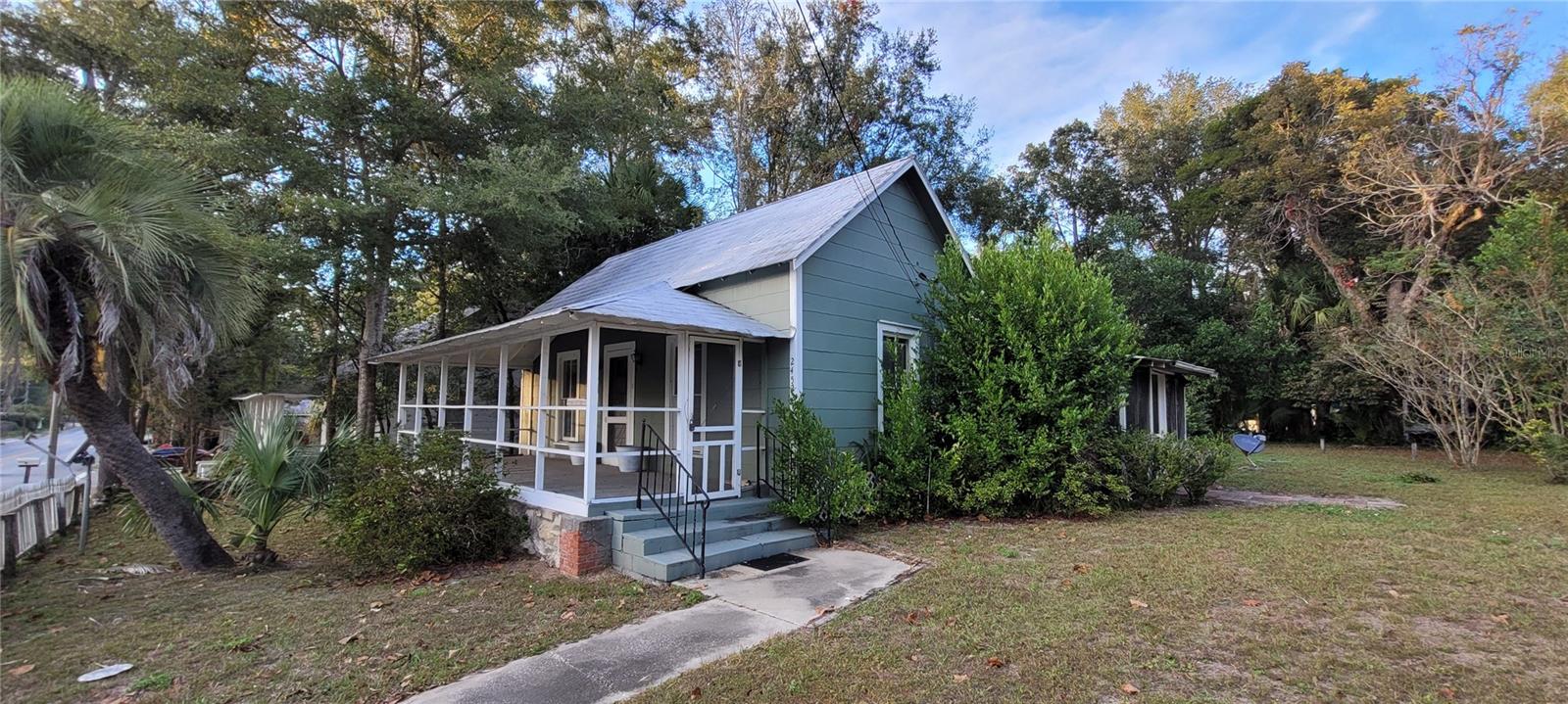 Commercial zoned home on US Highway 27 just outside of downtown High Springs. Has most recently been used as a duplex rental. It currently has two entrances. With some updating it makes a great investment property. Can't beat the location! Close to downtown High Springs and fresh water springs - Poe, Blue and Ginnie Springs.