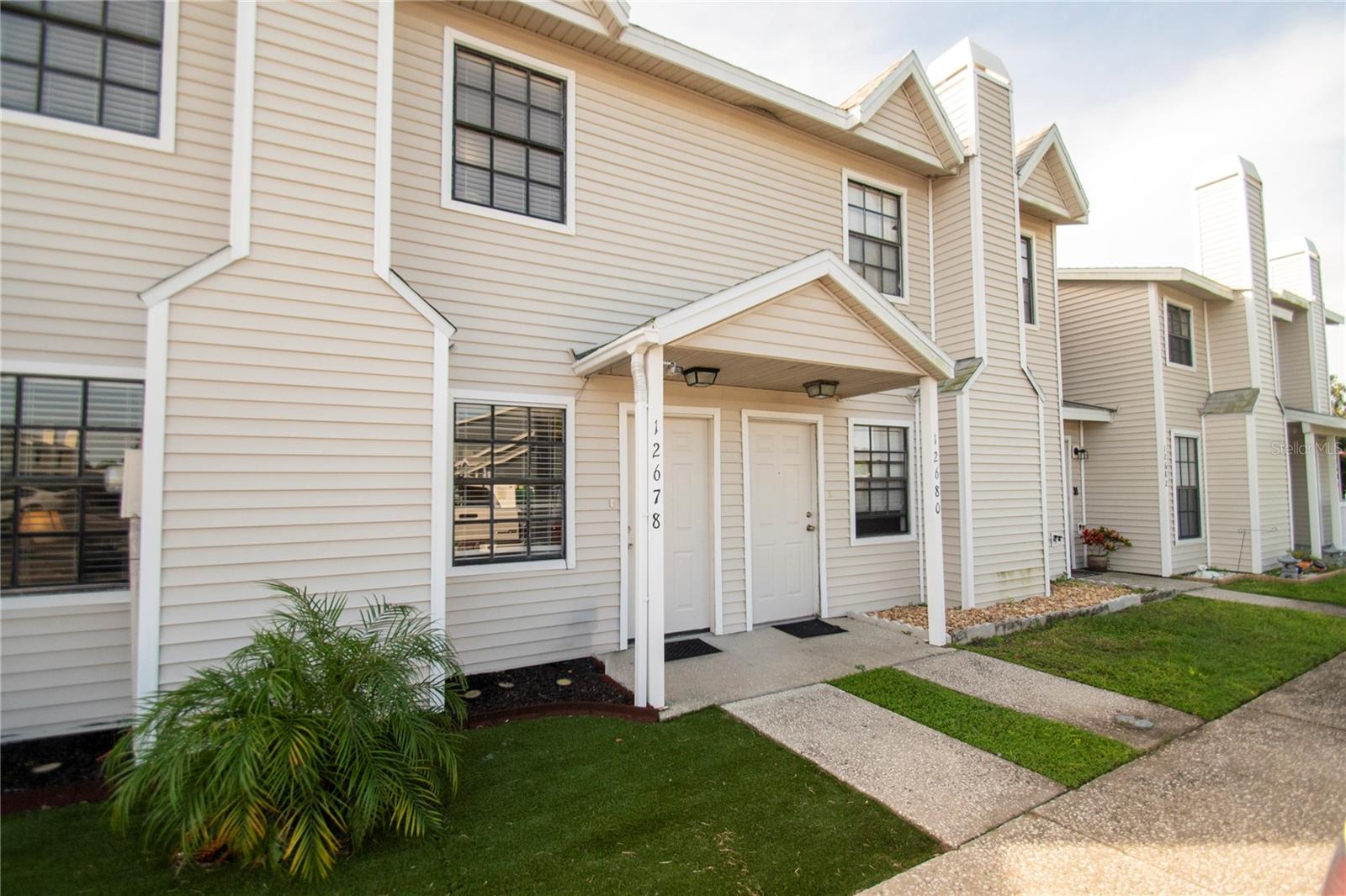 Welcome to 12678 Castle Hill Drive! This beautifully maintained 2-bedroom, 2.5-bath townhouse delivers comfort and convenience in the sought-after Hampton Park community.
Inside, enjoy a bright open floor plan, a cozy wood-burning fireplace, and a kitchen with stainless steel appliances and a convenient pass-through bar. The dining area opens to your screened patio with tranquil lake views — perfect for morning coffee or sunset wine.
Upstairs, the spacious primary suite features dual closets and a modern en-suite bath.
Step outside to community tennis courts, playground, and walking paths — all with low HOA fees and a prime location near shopping, dining, and major highways.
Don’t wait — schedule your private showing today and make this Tampa gem yours!