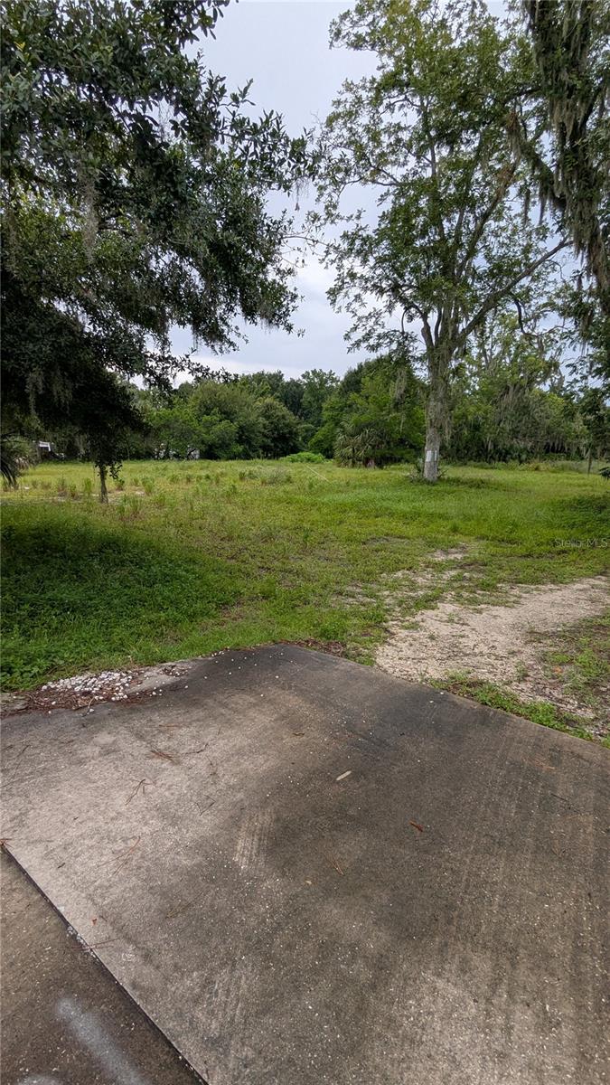 READY TO BUILD YOUR DREAM HOME? Come view this beautiful property that boasts almost 5 acres of land and a pond. It is centrally located to downtown Lakeland, I-4, and US-98. Use your creativity and vision to bring a new life to this property that is full of potential.