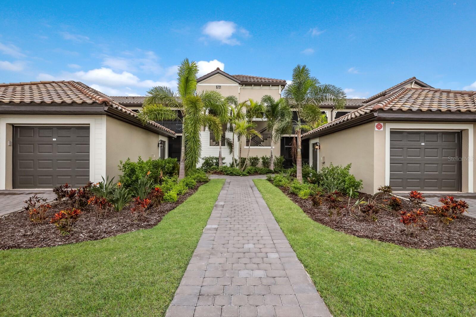 Escape to Luxury in this Stunning Arabella Model Veranda! Nestled in a serene corner of a picturesque community, this exquisite Arabella Model Veranda offers 1,569 square feet of beautifully appointed living space, plus two inviting lanai areas (front and rear), totaling 1,886 square feet of indoor and outdoor bliss. Start your day with a coffee on the rear lanai, watching the sunrise over tranquil lake views, or unwind in the evening with a glass of wine as the sun sets over the lush golf fairway from the front lanai. Gourmet Kitchen & Open-Concept living designed for the discerning chef, the gourmet kitchen boasts an expansive island with seating, perfect for casual meals or entertaining. The upgraded quartz countertops, wood cabinetry, and ample prep space make cooking a true pleasure. The open floor plan effortlessly flows into the spacious living and dining area, ideal for gatherings with family and friends. Stylish, Coastal-Inspired Interiors, furnished in a sleek, contemporary style with coastal touches, this condo exudes a light and airy atmosphere, making it the perfect retreat. The luxurious master suite features a king-size bed, two walk-in closets, and a spa-like en-suite bathroom with a glass walk-in shower, dual vanities, and stunning quartz countertops. The second bedroom offers a queen-size bed and its own walk-in closet, while the versatile third bedroom/den (with a window) is equipped with a queen sofa bed, making it perfect for additional guests or as a private office space. Convenience & Comfort - This condo has been fully updated with new furniture, appliances, and furnishings throughout. Enjoy modern conveniences like flat-screen smart TVs in every bedroom and den, high-speed Wi-Fi, and Spectrum Cable with a variety of channels. For added peace of mind, the unit is equipped with a smart deadbolt lock for secure entry. A washer and dryer are included inside for your convenience, and a one-car garage is available to store bikes, golf equipment, or anything else you prefer to keep outside the living space. Perfect Location & Stunning Views from the rear lanai, enjoy breathtaking sunrises over the lake, and catch the sunset from the front lanai while you relax. Whether you’re here to play golf, enjoy the outdoors, or simply relax in style, this condo offers the ideal spot for an unforgettable vacation. The Lakewood National amenities offer an exceptional resort lifestyle you and your family are sure to enjoy. Incredible amenities include, two 18-hole golf courses, resort pool with tiki bar, full-service spa, tennis and pickle ball courts, fitness center, bocce ball and more! Membership transfers for a small fee and all you pay is the cart fee! Close to the Gulf beaches, shopping and dining, with easy access to I75 and all of Lakewood Ranch. This stunning getaway is ready for you to call home—whether for a few months or a relaxing long-term stay. Don’t miss the opportunity to experience the best of lakeside living with a view of the golf course! Life is what you live, style is how you live it! Monthly rentals less than 6 months include utilities and utilities are subject to sales and Resort Taxes (13%). The HOA Membership Transfer Fee is $642.00. *Leased through 2025* Monthly Rate May - October is $3,000.00. December - April is $6,750.00/month.