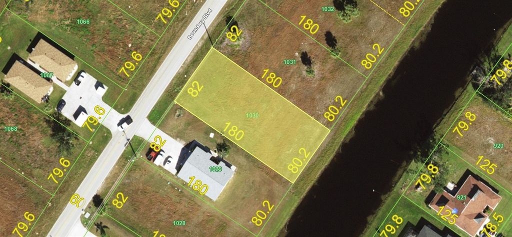 Photo of 322 Boundary Blvd, Rotonda West, FL 33947 (MLS # D6144259)