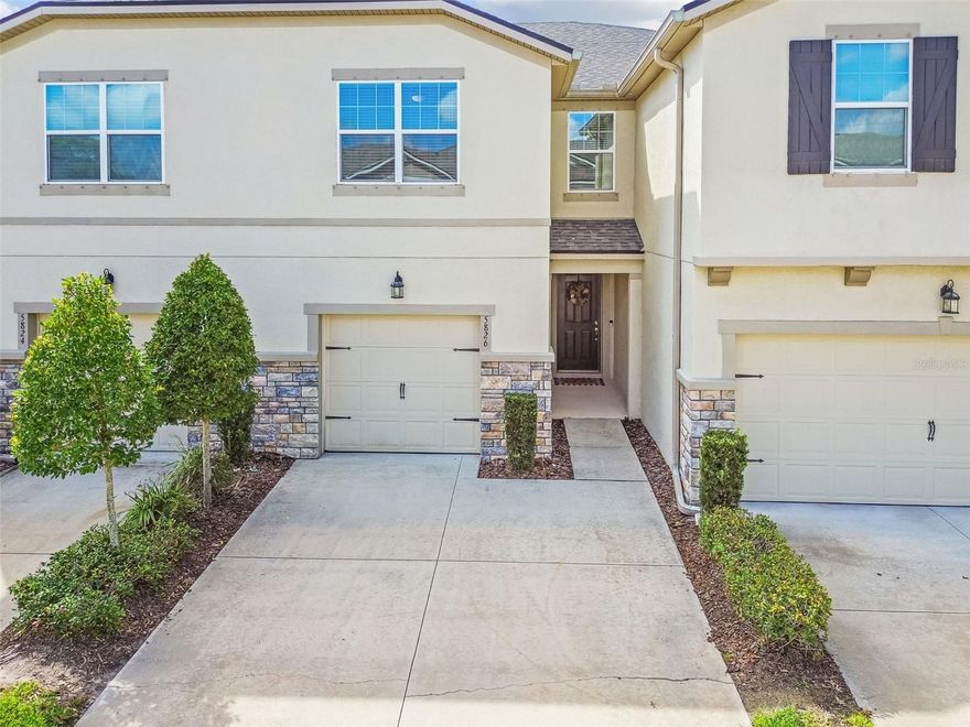 Welcome home to this beautiful townhome in the gated community of Avea Pointe in one of Hillsborough County’s most desirable areas! This move-in ready townhome offers a 3 bedroom with sizable loft, 2.5 bathroom, 1 car garage with an extended driveway, and WATER VIEWS. Built in 2020 by Mattamy Homes, this home offers low maintenance living. Come inside to a breathtaking yet modern cozy design that is light and bright. Open floor plan leads you to the heart of the home to include the kitchen and living space. The kitchen has been elegantly designed with 42 inch cabinets and trim detail, stainless steel appliances, a neutral tile backsplash, sparkling quartz countertops, and tons of storage. There is extra space for a coffee bar. Spacious center island provides additional seating and allows for easy conversation. There is space for a dining room table as well. Living area has high ceilings, luxury vinyl flooring throughout the main floor for durability and style, and serene views of the outside. 1/2 bath for convenience. Upstairs, a large loft offers flexible space for a media room, home office, or play area. The primary retreat is situated on one end of the upstairs for privacy. Beautiful bathroom with tiled walk in shower and glass enclosure, dual quartz vanities, and ample storage. There are two closets for convenience, one being a spacious walk-in. The primary space is the perfect spot to relax. Down the hallway are 2 large bedrooms with generous closet space that share a full bathroom. Storage closets throughout this amazing floor plan provide extra space. The screened in back porch overlooking the water is complete with sun shades for year round comfort. The backyard space is stunning and the local wildlife is everywhere. Residents of Avea Pointe enjoy resort-like style amenities including a community swimming pool with an inviting deck area, grill area, and play park. Easy access to the Veterans Expressway for travel to Tampa and the International Airport. Zoned for A+ schools which are nearby, hospital, grocery stores, restaurants, high-end shopping/outlet mall, and entertainment are all at your fingertips. Make sure to view the guided video.