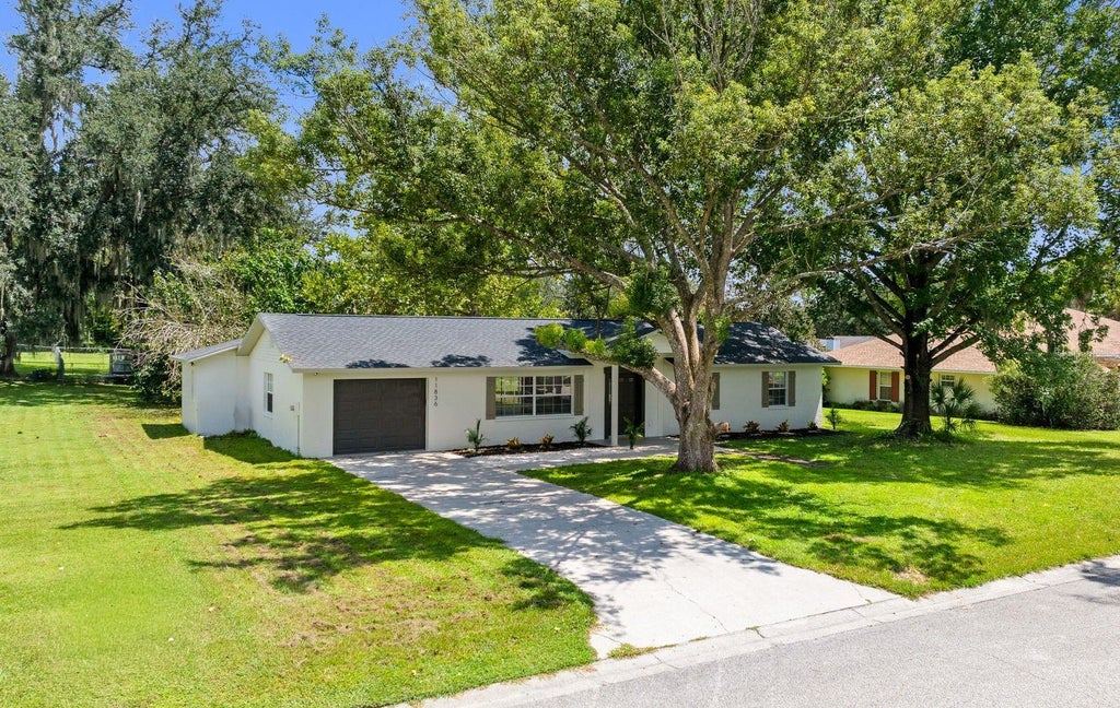 Photo of 11836 Orange Street, San Antonio, FL 33576 (MLS # TB8544882)