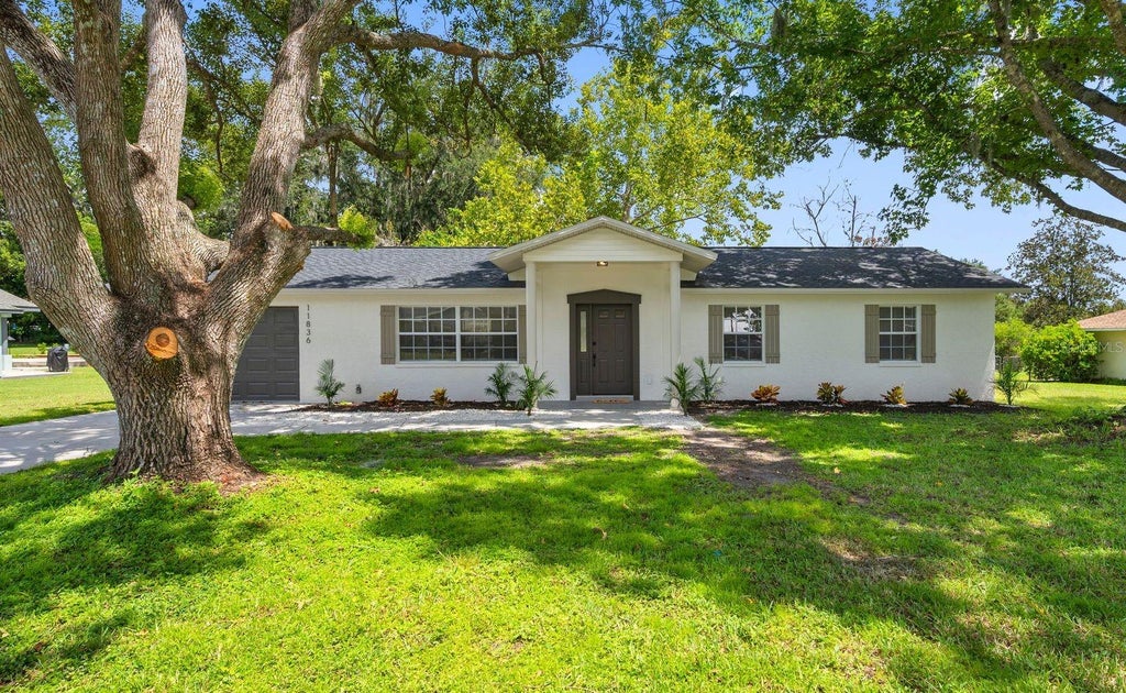 Photo of 11836 Orange Street, San Antonio, FL 33576 (MLS # TB8544882)