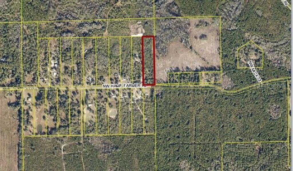 Photo of 1077 NW Hamp Farmer Road, Lake City, FL 32055 (MLS # O6394145)