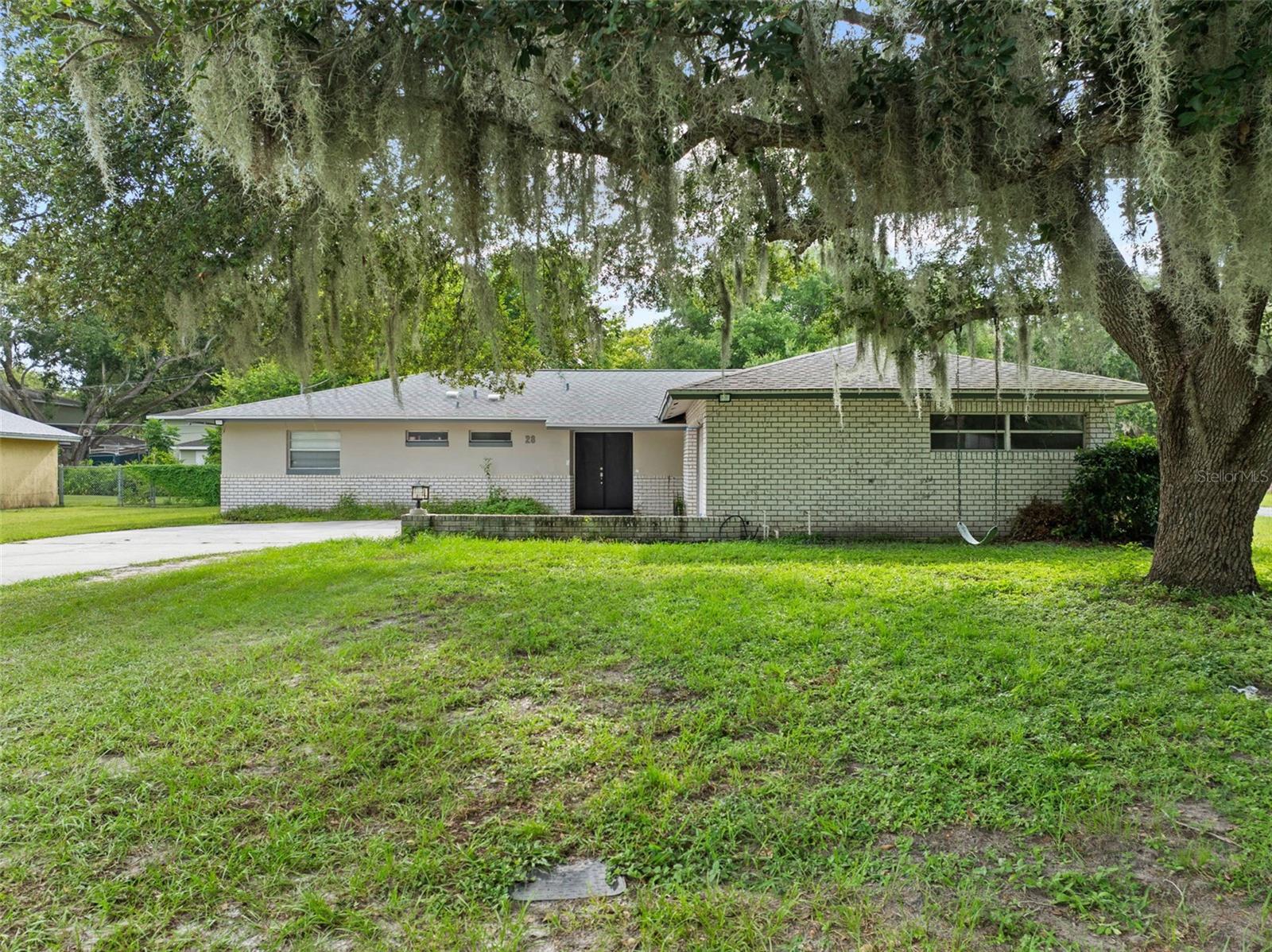 Charming and serene corner-lot single-family home for sale in the heart of Kissimmee. This spacious 3-bedroom, 2-bathroom property offers 1,745 square feet of living space on a large 0.28-acre lot. The home has been well maintained and features a bright kitchen with stainless steel appliances, abundant storage, and natural light throughout. It also includes a two-car garage, central heating and air conditioning, and a cozy patio that opens to a huge backyard—perfect for outdoor gatherings or private relaxation. A new roof was installed in 2022, and the property is currently rented until October, with the tenant paying $2,165 per month, making it an excellent opportunity for investors or buyers seeking future rental income. Located on a quiet corner lot in the Cadillac Homes subdivision, this home offers solid construction, timeless charm, and a convenient location. Don’t miss your chance to make this gem your own—schedule a showing today!