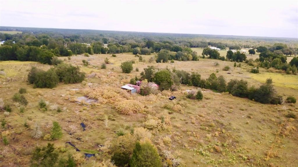 Photo of 14385 SW Highway 484, Dunnellon, FL 34432 (MLS # W7879622)