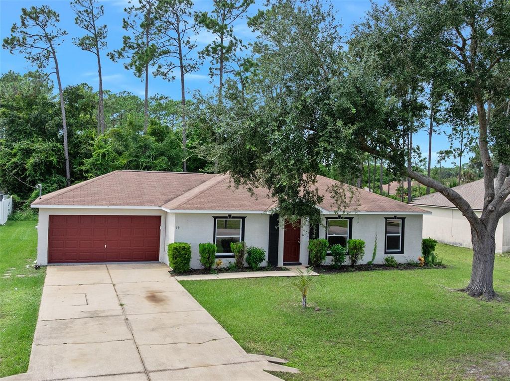 Photo of 59 Brewster Lane, Palm Coast, FL 32137 (MLS # V4944994)
