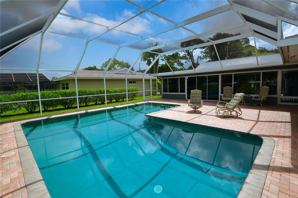 Photo of 6690 Burning Tree Drive, Seminole, FL 33777 (MLS # TB8470201)