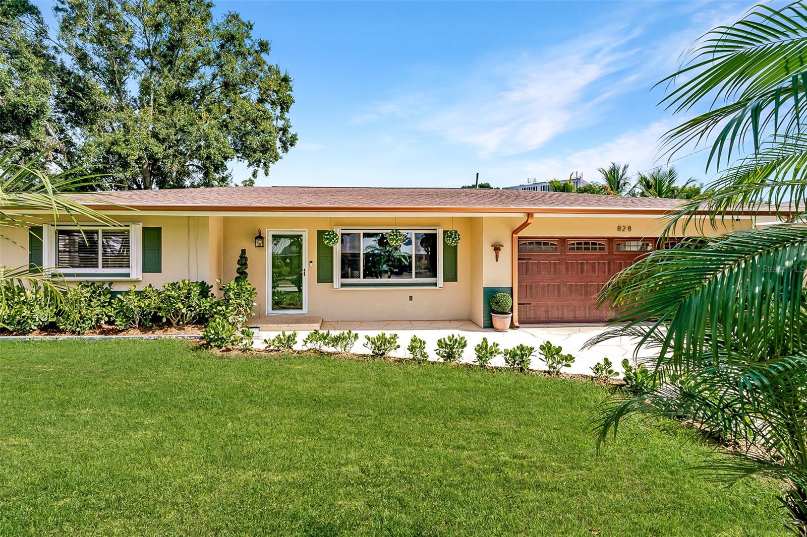 WELCOME to this MOVE-IN READY LARGO HOME combining MODERN UPDATES, ECLECTIC STYLE, and a PRIME LOCATION. Major improvements in (2018) include a NEW ROOF, NEW GUTTERS, decorative CONCRETE DRIVEWAY, PVC FENCING, and an electric GARAGE DOOR with keypad. More recent updates in (2025) provide even greater VALUE and PEACE OF MIND: NEW HOT WATER HEATER, partial ELECTRICAL PANEL, all NEW LIGHTING, full INTERIOR + EXTERIOR PAINT, DRIVEWAY RESEAL, updated SPRINKLER SYSTEM, all NEW IMPACT DOORS, and NEW DOOR KNOBS throughout.
Both BATHROOMS were RENOVATED within the last 5 years, including one with WHEELCHAIR ACCESSIBILITY.
Inside you’ll find 2 BEDROOMS + 2 BATHS and a FLEX ROOM perfect for DINING, OFFICE, or any CREATIVE USE. Flooring includes VINYL PLANKING, TILE, and original TERRAZZO - with TERRAZZO running underneath much of the home, adding VALUE and RESTORATION POTENTIAL. The OVERSIZED 2-CAR GARAGE provides STORAGE and WORKSHOP flexibility, and the EXTRA-LARGE LAUNDRY ROOM with BUILT-IN CABINETS adds FUNCTIONAL SPACE rarely found at this price point. More than half of the windows are already IMPACT RESISTANT, with the remaining windows protected by BUILT-IN HURRICANE SHUTTERS.
Outdoor living features a LARGE SCREENED-IN PATIO and FULLY FENCED YARD - the perfect setting for RELAXING, ENTERTAINING, or enjoying FIREWORKS from nearby LARGO CENTRAL PARK every JULY 4TH.
This NON-FLOOD ZONE property is ideally located minutes from the NEWLY BUILT LARGO HIGH SCHOOL, BENNETT ELEMENTARY, DOWNTOWN LARGO, HCA FLORIDA LARGO HOSPITAL, and abundant SHOPPING + DINING. INDIAN ROCKS BEACH is just 3 MILES AWAY, offering the best of PINELLAS COUNTY LIFESTYLE.
Don’t miss this RARE OPPORTUNITY - schedule your private showing today and make this unique Largo property YOURS!