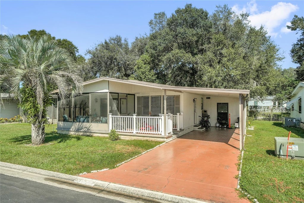 Photo of 34405 Countryside Drive, Wesley Chapel, FL 33543 (MLS # S5160070)