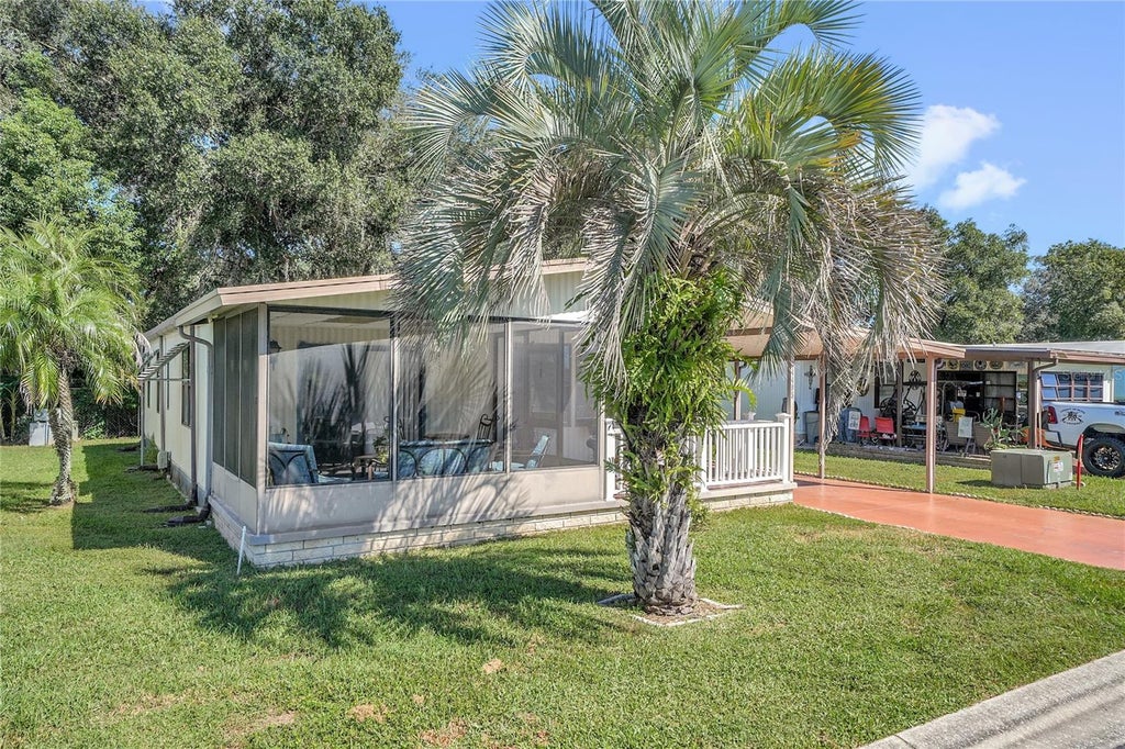 Photo of 34405 Countryside Drive, Wesley Chapel, FL 33543 (MLS # S5160070)