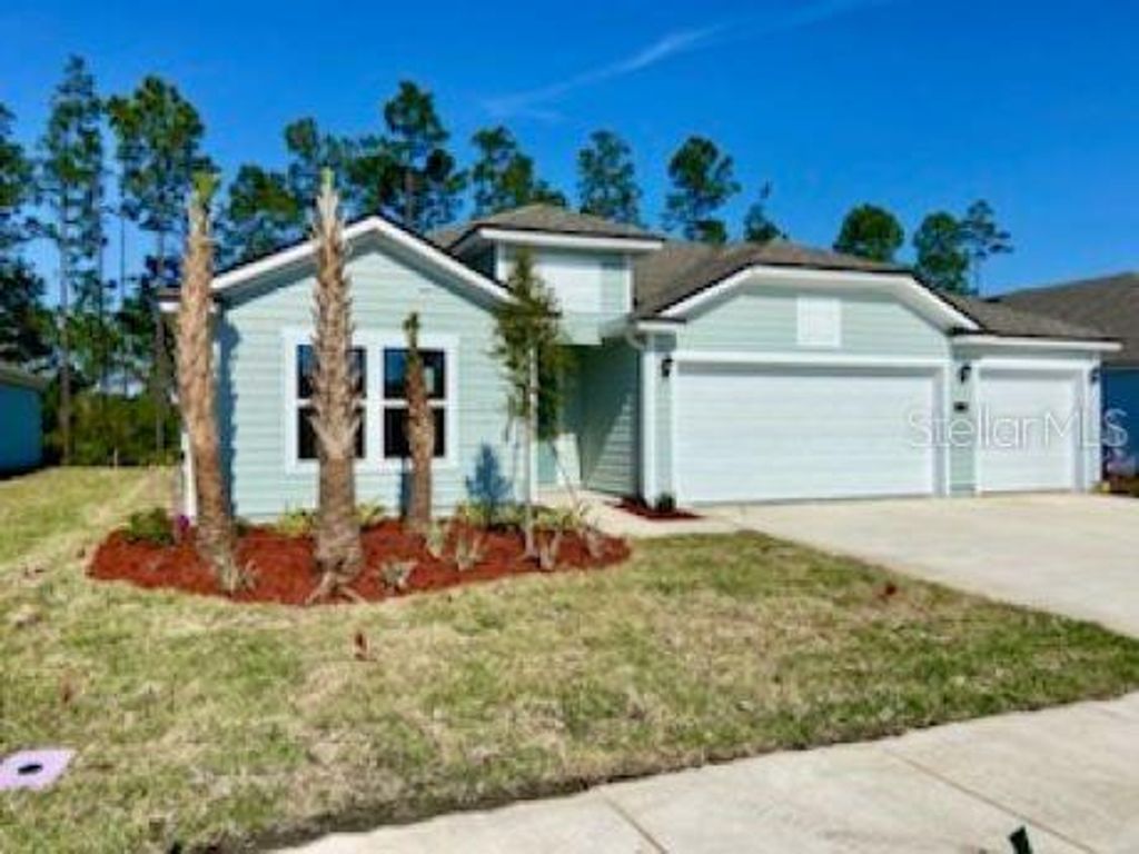 Photo of 12 Lumber Jack Trail, Palm Coast, FL 32137 (MLS # FC299112)