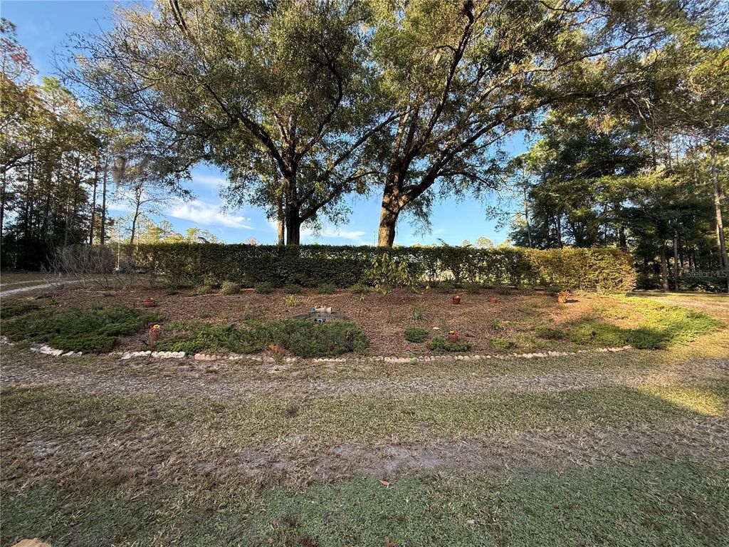 Photo of 20840 SW 88th Place Road, Dunnellon, FL 34431 (MLS # OM716037)