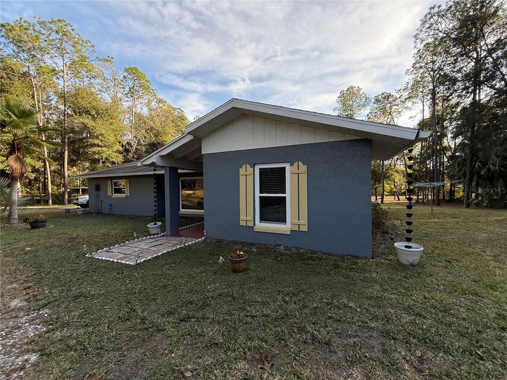 Photo of 20840 SW 88th Place Road, Dunnellon, FL 34431 (MLS # OM716037)