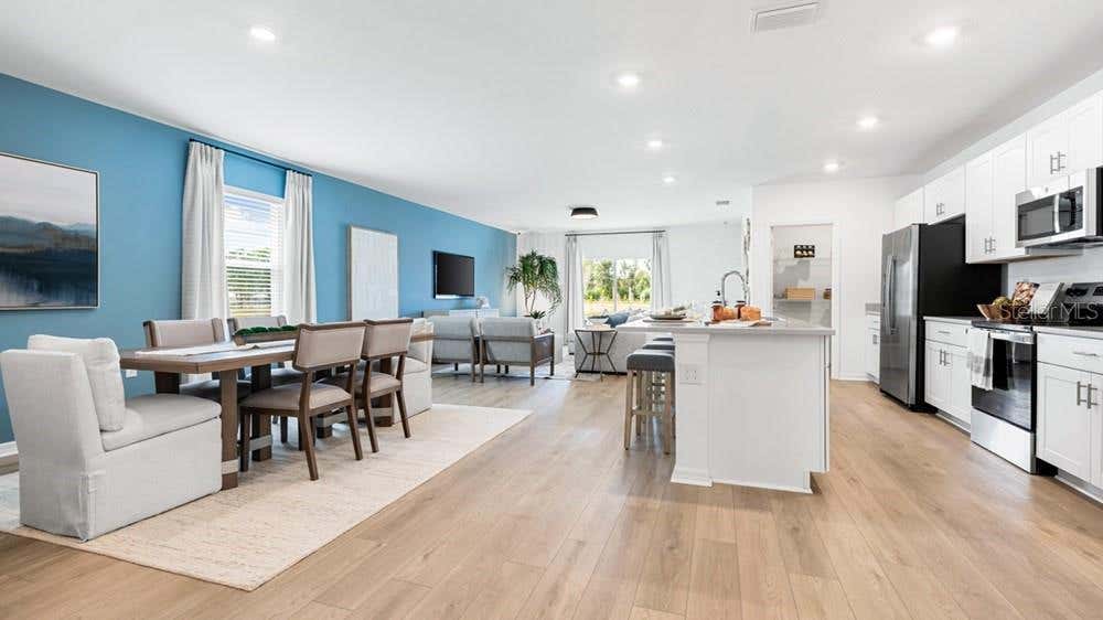 Photo of 13681 Tropical Breeze Way, Hudson, FL 34669 (MLS # TB8531233)