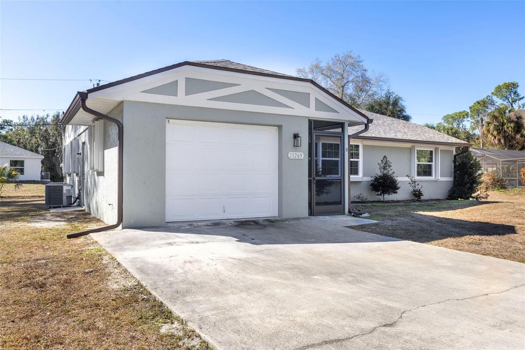 Photo of 21269 Kennedy Avenue, Port Charlotte, FL 33952 (MLS # D6146265)