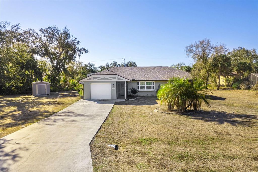 Photo of 21269 Kennedy Avenue, Port Charlotte, FL 33952 (MLS # D6146265)