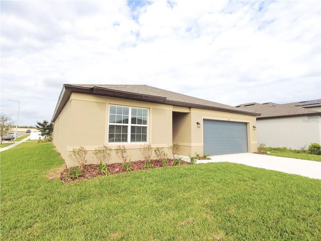 Photo of 514 Citrus Isle Blvd, Davenport, FL 33837 (MLS # O6348390)