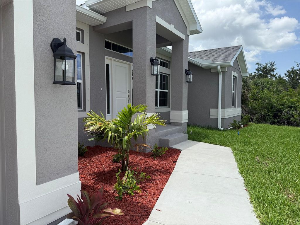 Photo of 10023 Greetings Street, Port Charlotte, FL 33981 (MLS # C7510975)