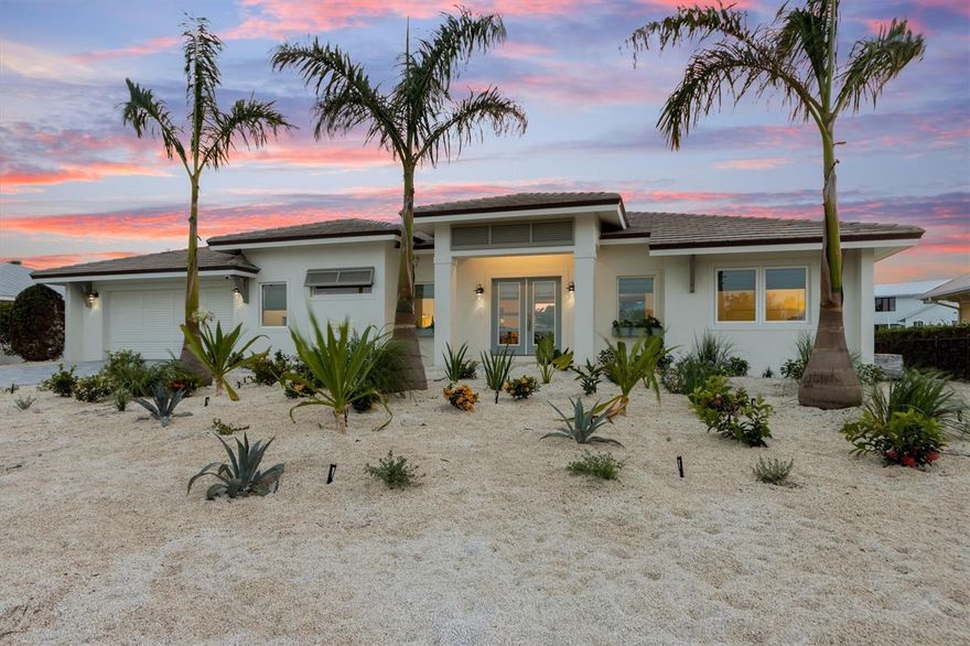 Welcome to your dream home!  This fully renovated, never lived in masterpiece is one in a million.  Enjoy peace of mind - this property incurred NO STORM DAMAGE and is positioned on a street with one of the highest elevations on the island.  The home is meticulously renovated and updated with the highest attention to detail.  Imagine living on a serene CANAL with rapid intracoastal access, breathtaking GOLF COURSE VIEWS and easy access to Anna Maria’s famous sandy white beaches.  



The inside features brand new designer furnishings throughout, a gourmet kitchen outfitted with top-of-the-line appliances, elegant open-concept living spaces, a gas fireplace, electric blinds, high ceilings, and so much more.   The split floor plan provides privacy for the master bedroom and elegant spa bathroom.  Guest rooms are beautifully appointed and enjoy views of the golf course and infinity pool.

Outdoor living is at its finest.  This is a boater’s dream with direct access to Bimini Bay, the intracoastal and the Gulf of Mexico.  With a brand-new dock and direct water access, outdoor activity and boating have never been easier.  Enjoy boating, kayaking, paddle boarding and fishing.  Step into resort-style living with an infinity-edge pool and a luxurious outdoor gas fire pit.   Have trouble getting reservations during season?  Not anymore!   Located in the prestigious Key Royale community, the Key Royale private club is directly across the street.  Members will easily walk across the street to play golf, attend social events and meet friends for drinks and dinner at Key Royale Club.   Quaint Anna Maria Island restaurants, boutique shopping, world famous sunsets, historic Pine Avenue, and sandy white beaches complete the island dream.  This exceptional home offers the ultimate Florida lifestyle.  Turnkey and move-in ready—schedule your private tour today!