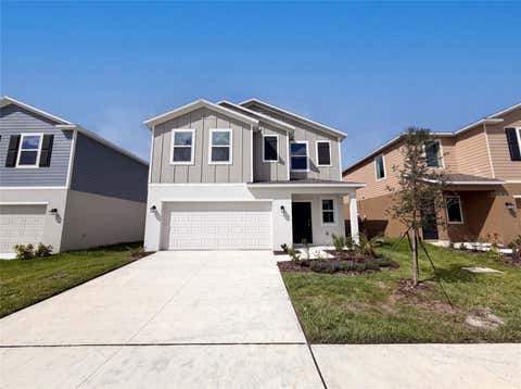 Photo of 2142 Lasso Loop, Eagle Lake, FL 33839 (MLS # O6433597)