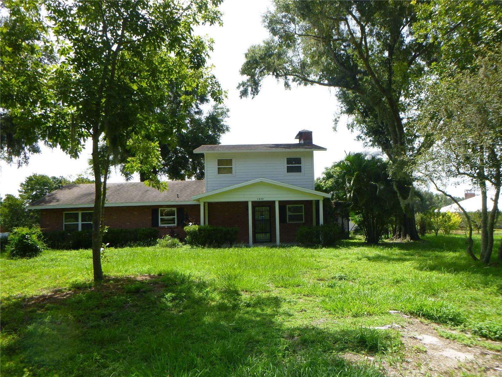 THIS HOME IS READY FOR YOU IN THE COUNTRY! HOME HAS BEAUTIFUL UPDATED BATHROOMS AND A LARGE KITCHEN FOR ALL OF THOSE DELICIOUS MEALS OUT OF YOUR GARDEN. LIVING ROOM HAS WOOD BURNING FIREPLACE. A 31X13 SCREEN ROOM WAS ADDED IN 2023 AND THE AIR UCONDITIONING UNIT IS 2024. SPA HOT TUB ON SCREEN PORCH CONVEYS BUT NOT WARRENTED. OUTDOOR AREA WITH BURN PIT TO RELAX AND ENJOY THE EVENING AFTER WORKING IN THE HUGE BARN WHICH DOES HAVE ELECTRIC.