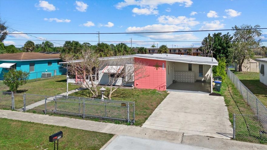 Step into a true mid-century modern time capsule at 6019 Merril St in the sought-after Hyde Park neighborhood of North Port. Built in 1959, this 3-bedroom, 2-bath home captures the character and architectural charm of an era that continues to inspire design today, while blending in the updates buyers want.

From the moment you enter, the original terrazzo floors immediately stand out. These beautifully preserved floors are not only durable but are a rare and highly desirable feature that perfectly anchor the home’s mid-century aesthetic. Their clean lines and timeless appeal set the tone throughout the space and make this property truly special.

The home offers a functional layout with vaulted ceilings that enhance the open feel and natural light. The updated kitchen features new cabinetry, countertops, and appliances, providing a fresh, modern touch while still complementing the home’s original character. Both bathrooms have been tastefully updated, including an ensuite primary bath for added privacy and convenience.

Additional interior highlights include an inside laundry room and an enclosed sunroom that provides extra living space, perfect for relaxing or entertaining year-round. Step outside to a screened lanai, where you can enjoy Florida’s outdoor lifestyle.

Situated on an oversized .30+ acre lot, the property offers a fenced yard with plenty of room for pets, gardening, or future additions. The canal frontage adds both privacy and a serene backdrop that is hard to find at this price point.

Location is another major advantage. You are just minutes to shopping, dining, and everyday conveniences, with easy access to US-41 and I-75 for commuting. Wellen Park and the Atlanta Braves Spring Training facility are a short drive away, along with the vibrant downtown Venice area and Gulf beaches. Nearby hospitals and medical facilities provide peace of mind, making this an ideal full-time residence or seasonal retreat.

This is more than just a home, it’s a preserved piece of architectural history with modern updates in all the right places. Opportunities like this are rare, especially with original terrazzo floors in such excellent condition.