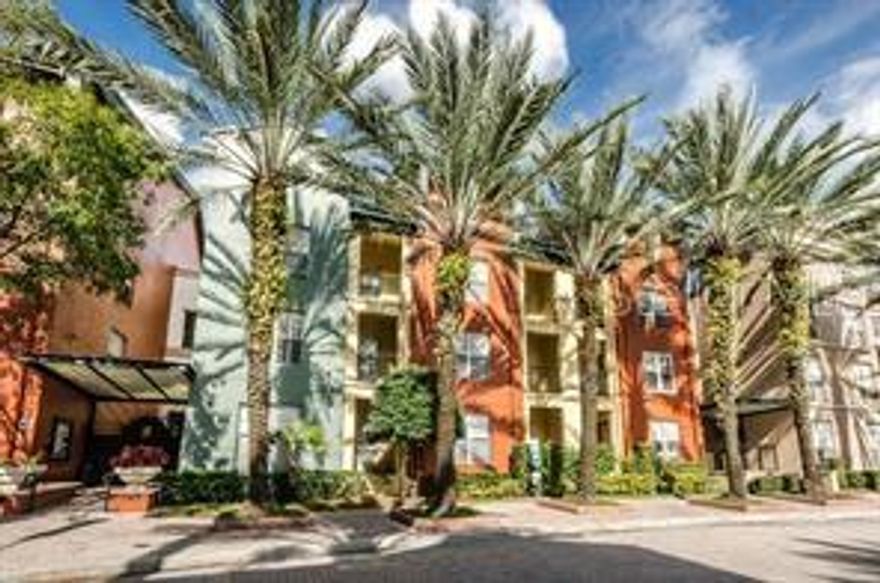 PRIME SoHo LOCATION! POOL VIEW 
 1st floor!!  NO STEPS!!!   FANTASTIC layout and sizable walk-in closet !! Featuring high, urban living style ceilings, LUXURY vinyl flooring throughout. JUST INSTALLED PLANTATION SHUTTERS
 ASSIGNED PARKING SPACE in a gated parking garage ! UPDATED KITCHEN!! Kitchen is in the center of the home overlooking the living area with a pass-through breakfast bar includes stainless steel refrigerator, microwave and dishwasher. Laundry room has large washer and dryer. MAINTENANCE FREE lifestyle with front door trash valet. The community features a resort styled pool, free standing jacuzzi, tropical planters and landscape, grill, lounge chairs, and picnic tables. Gated access points from different entry points around the entire condo community which creates true ease to come and go with added peace of mind. Mere steps to Publix, CVS, South Howard Ave, a variety of restaurants, salons, bars, and coffee houses. Short walk to doctors, dentist, LabCorp, and more. Enjoy the ease of convenience to places like 275 (approx. 1 mile) Armature Works (approx. 3 miles), Downtown Tampa (approx. 2 miles), Channelside (approx. 2 miles). Tampa International Airport and Plaza (approx. 7 miles). PET FRIENDLY! Fabulous heated resort style pool with sizzling hot tub! Lavish green gardens with art deco planters with tropical landscape surround the brick lined walkways in the tranquil courtyard. Easy glide to the pool and hot tub!! Super close to parking garage and mail boxes. Starbucks, Panera, CVS, Smoothie King, and PUBLIX are all within steps from the Madison at Soho! Enjoy the benefits of living in the Hyde Park SoHo district! Live the SoHo dream!