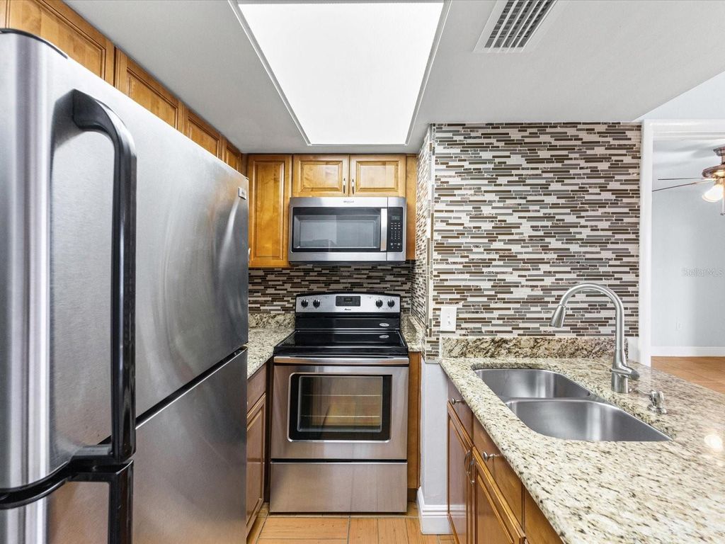 Photo of 4712 Marine Parkway #206, New Port Richey, FL 34652 (MLS # TB8479038)