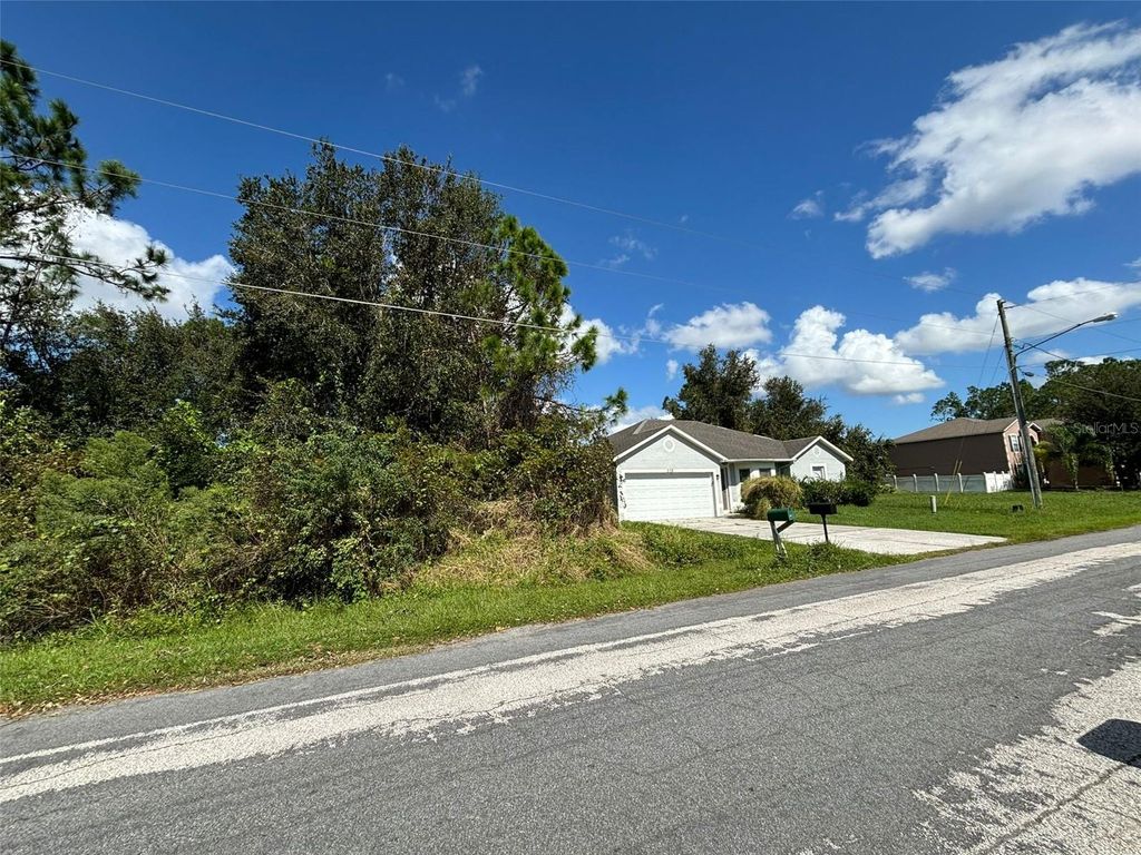 Photo of 310 Cardiff Drive, Poinciana, FL 34758 (MLS # S5141491)